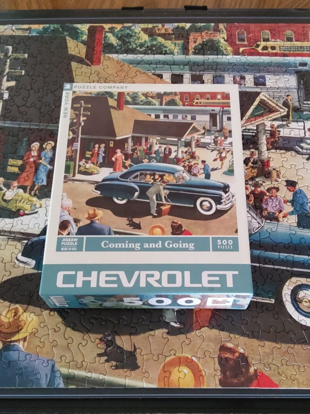 New York Puzzle Company Coming and Going 500 Piece Jigsaw Puzzle Chevrolet Train